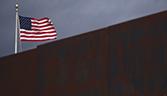 US flag and wall